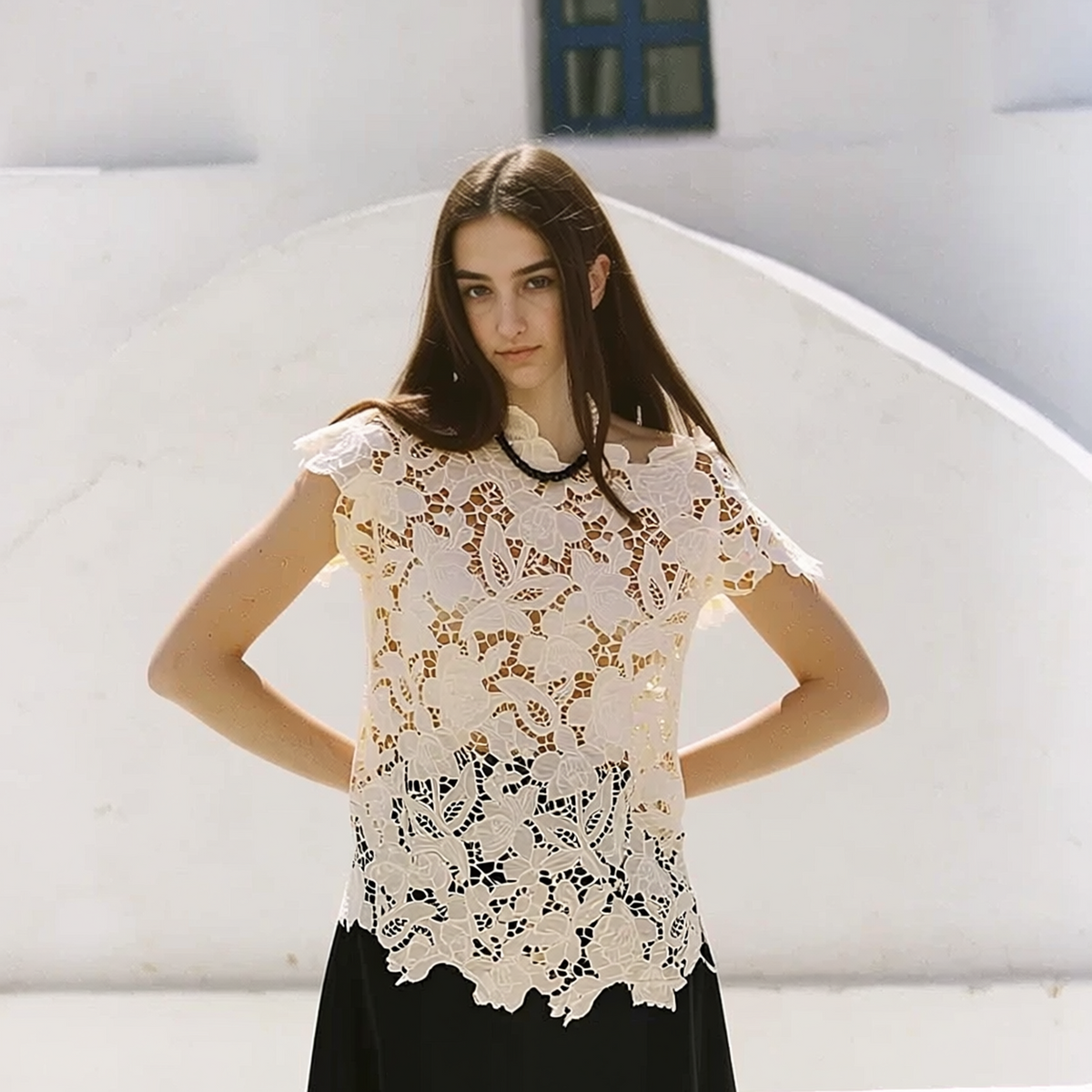Model wearing Behati Laser-Cut Lace Top in Ivory, full-body view | Rosalara